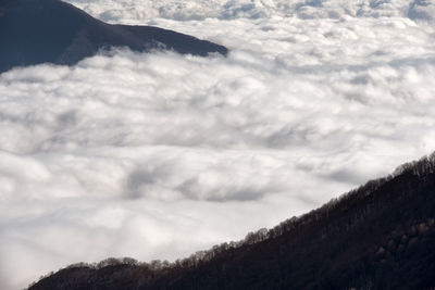 Low angle view of majestic mountain against sky