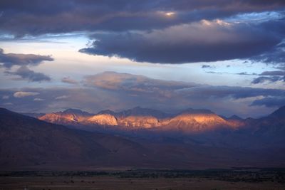 Scenic view of mountains against sky during sunset