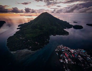 Aerial view of townscape against sky during sunset