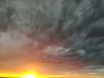 Low angle view of dramatic sky during sunset