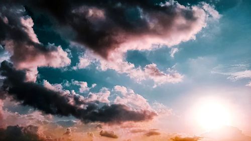 Low angle view of clouds in sky during sunset