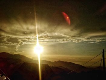 Scenic view of silhouette mountain against sky during sunset