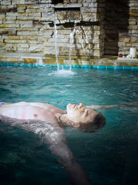 Woman swimming in water