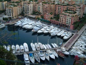 High angle view of boats moored in city