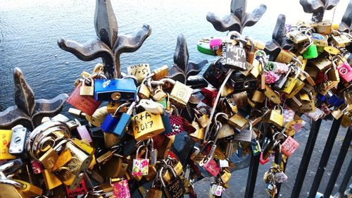 Low angle view of padlocks on railing