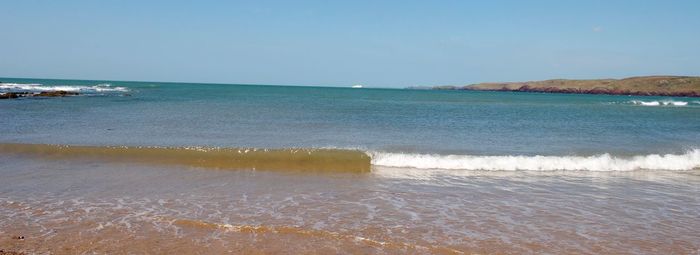 Scenic view of sea against clear sky