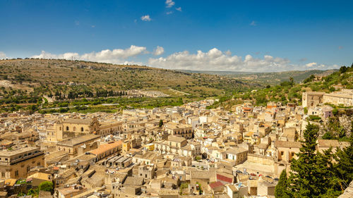 High angle shot of townscape against sky