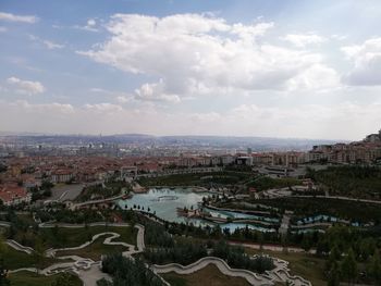 High angle view of buildings in city against sky