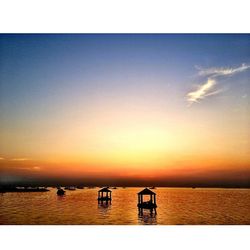 Scenic view of sea at sunset