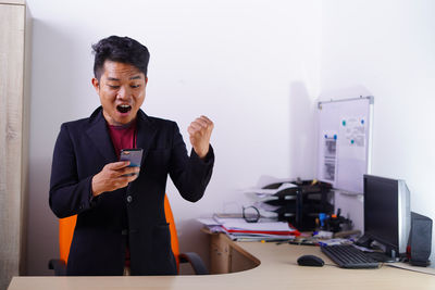 Young man using mobile phone