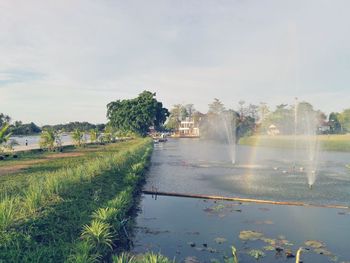 Scenic view of park against sky