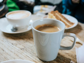 Close-up of coffee cup on table