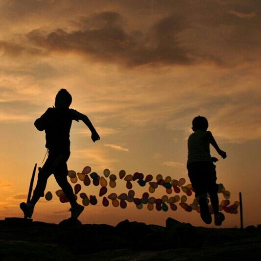 sunset, full length, silhouette, lifestyles, leisure activity, sky, men, orange color, childhood, standing, boys, cloud - sky, togetherness, love, girls, sport, outdoors