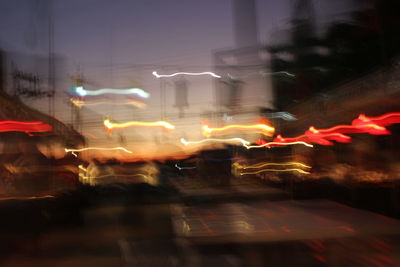 Blurred motion of crowd in city at night