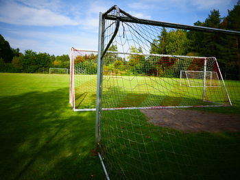 Empty soccer field against sky