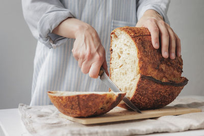 Midsection of man preparing food