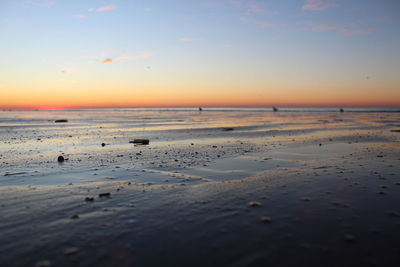 Scenic view of beach during sunset