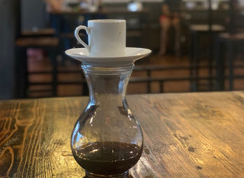 Close-up of coffee cup on table