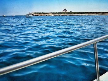 Boats in calm blue sea