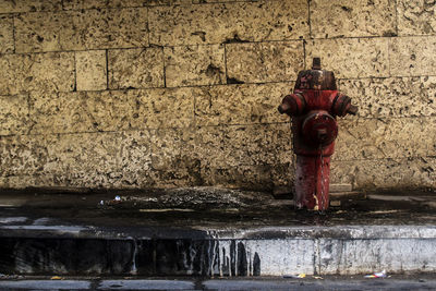 Man standing by water