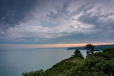 Scenic view of sea against sky during sunset