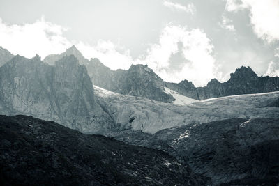 Panoramic view of rocky mountains against sky