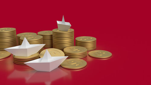 High angle view of coins on table
