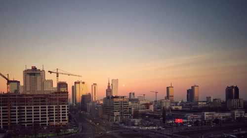 Cityscape against sky during sunset