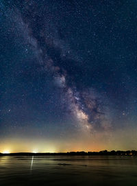 Scenic view of star field against sky at night