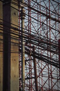 Low angle view of metal structure against sky