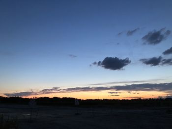 Scenic view of silhouette landscape against sky during sunset