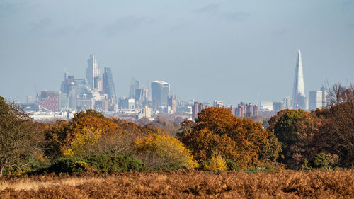 View of buildings in city against sky