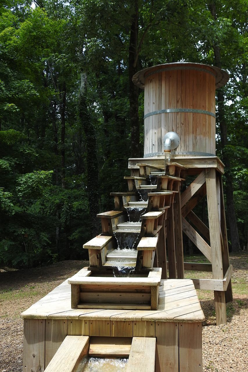 WOODEN TABLE IN PARK