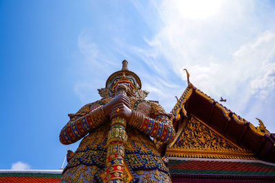 Low angle view of statue of building against sky