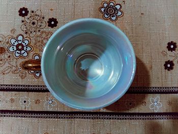 Directly above shot of coffee cup on table