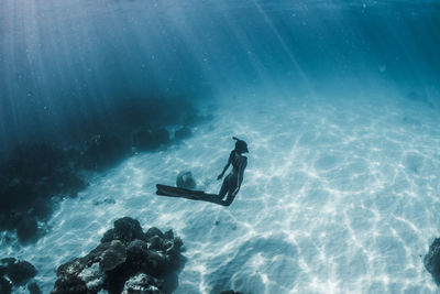 Person swimming in sea