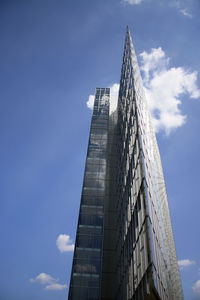 Low angle view of skyscrapers against sky