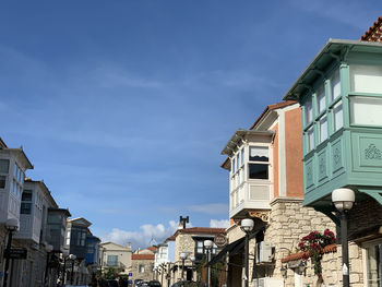 Low angle view of buildings in alacati city