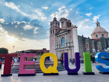 View of multi colored buildings in city