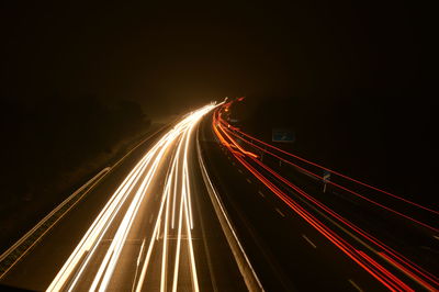 Light trails on road at night