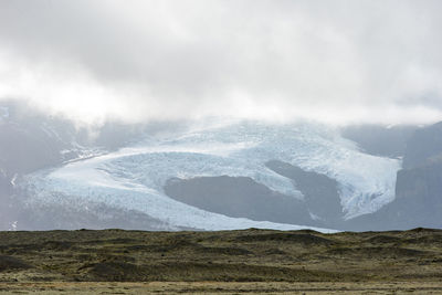 Melting glacial tongue of fjallsjokull glacier, iceland. global warming concept