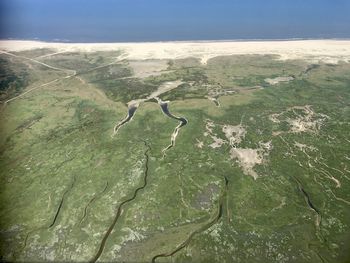 Scenic view of land against sky