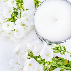 Soy wax candle with white flowers