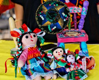 Close-up of toys for sale at market stall