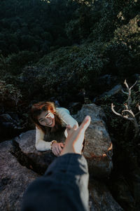 Portrait of woman on rock