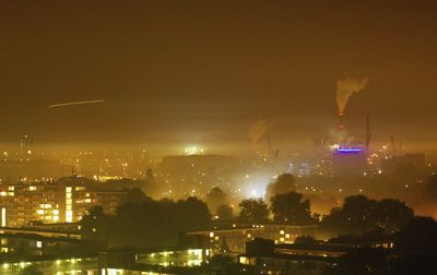 Illuminated cityscape at night