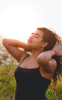 Beautiful young woman wearing hat