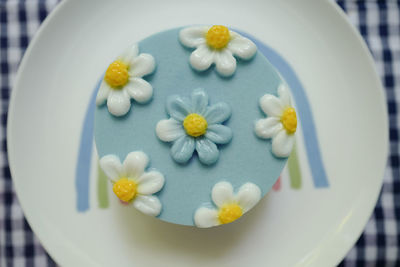 High angle view of white flowers in plate on table