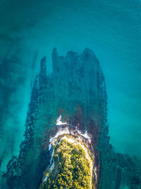 High angle view of rock formation in sea