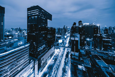 High angle view of illuminated buildings against sky